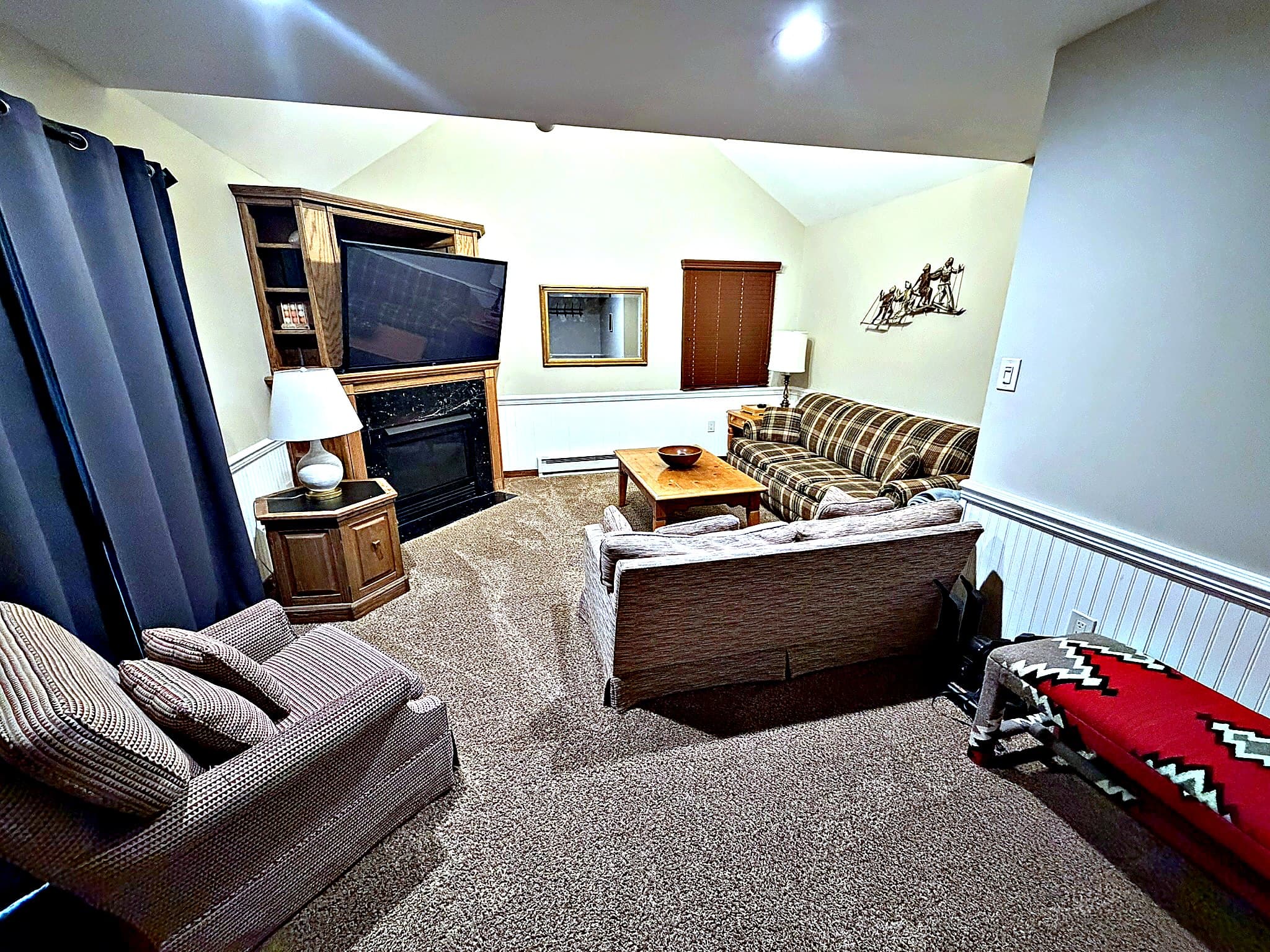 Full kitchen with stainless appliances and granite island